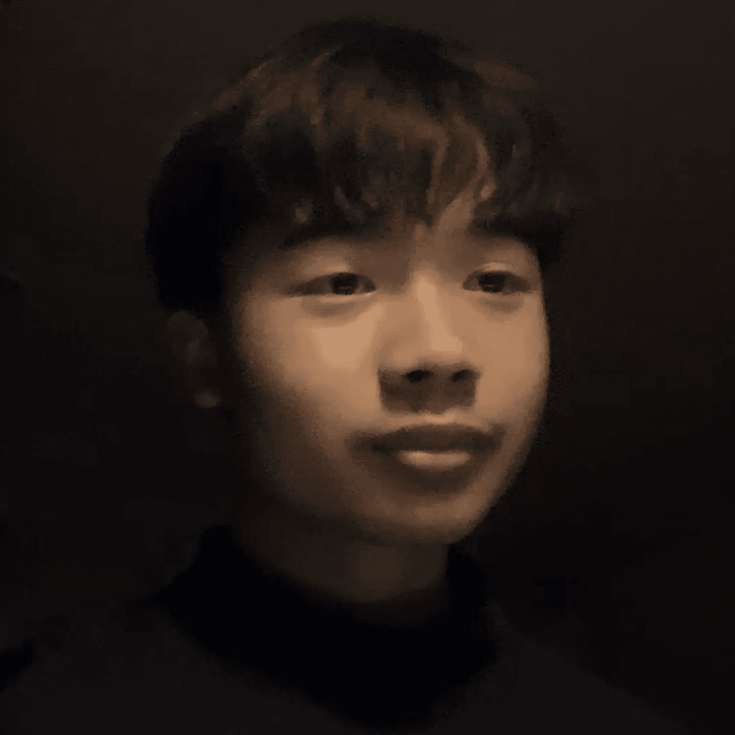 A headshot image of Kyle Huang.